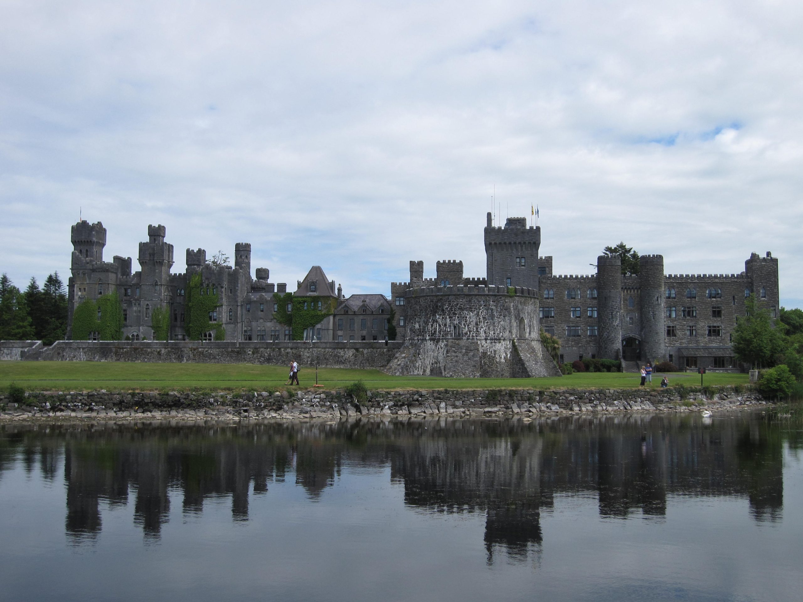 Ashford Castle hotel viewed across the water of Lough Corrib in County Mayo, Ireland
