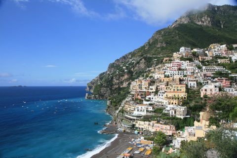 Amalfi Coast travel guide view of colorful Positano cliffside houses