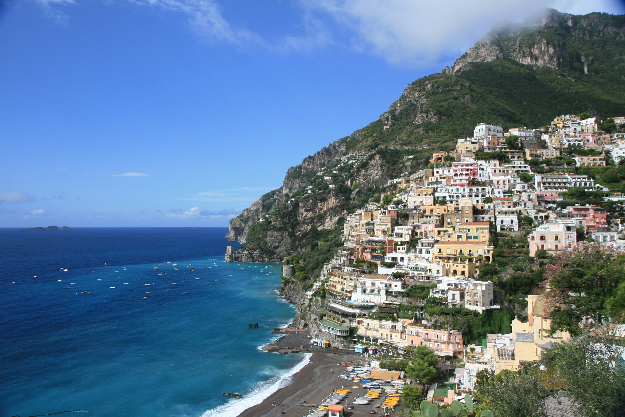 Amalfi Coast travel guide view of colorful Positano cliffside houses