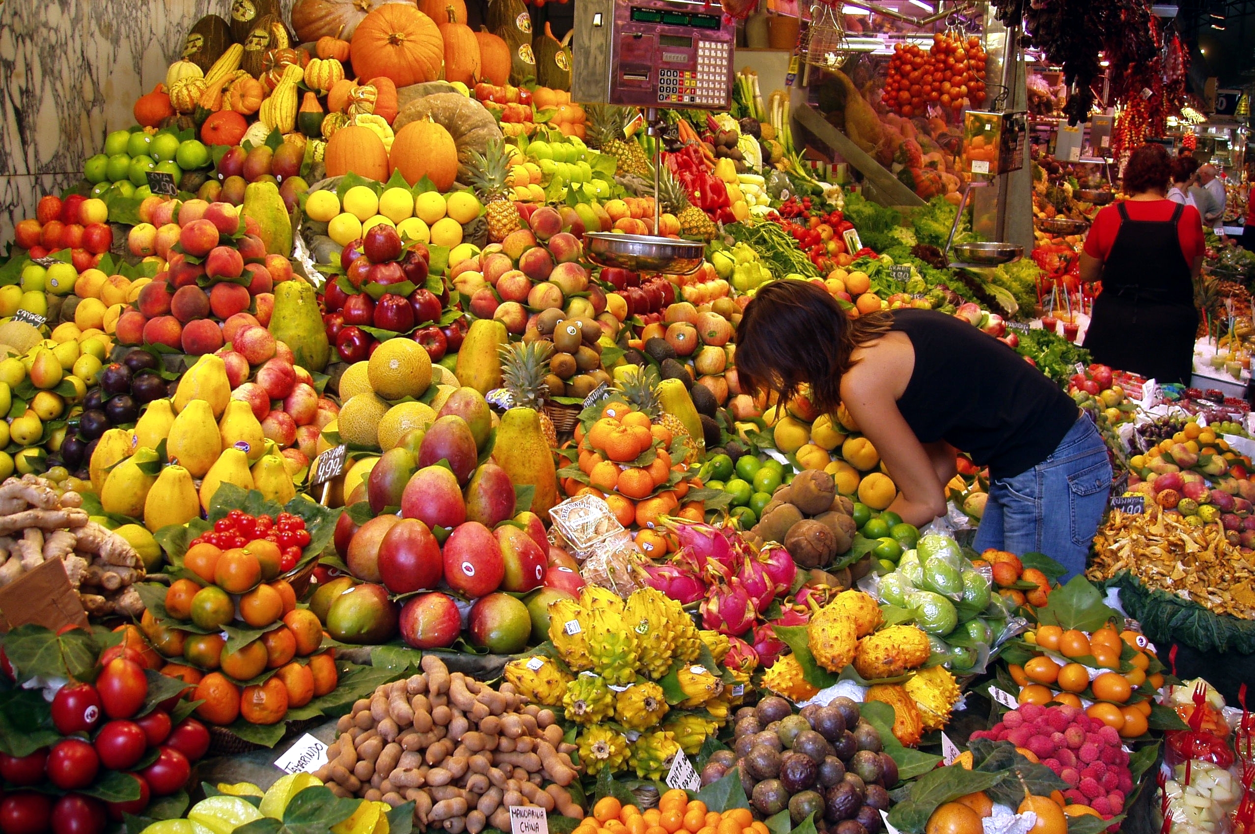 Colorful fruit stall in a Barcelona market, part of Europe's best food cities for a culinary trip