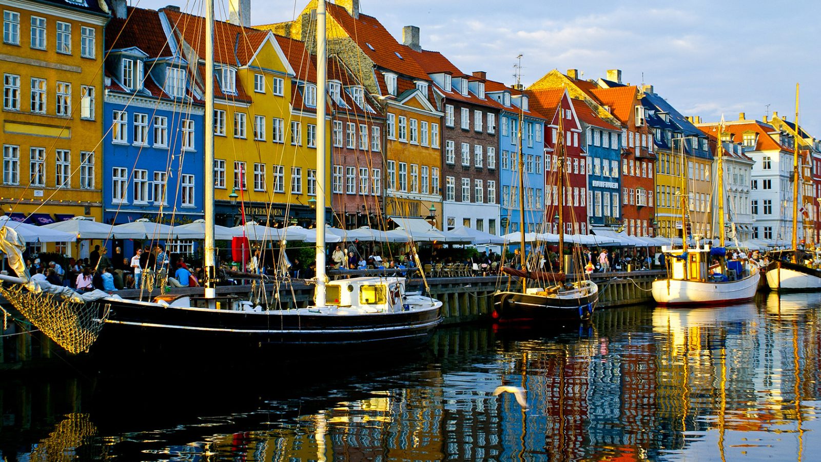 Colorful townhouses along the Nyhavn canal near boutique hotels in Copenhagen