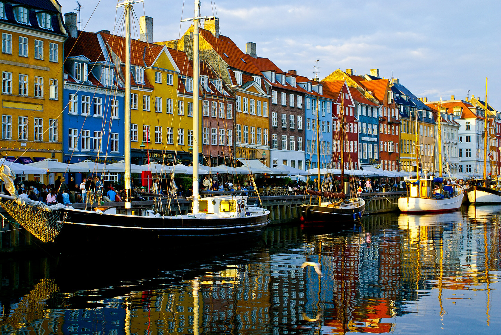 Colorful townhouses along the Nyhavn canal near boutique hotels in Copenhagen