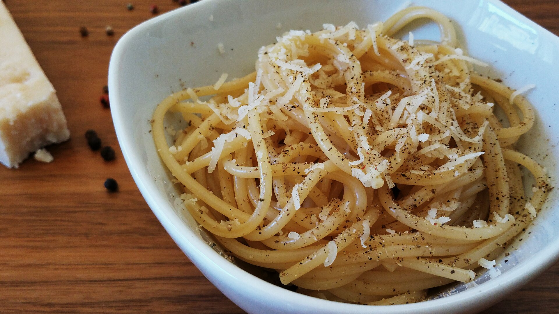 A plate of cacio e pepe, the classic Roman pasta of pecorino and black pepper