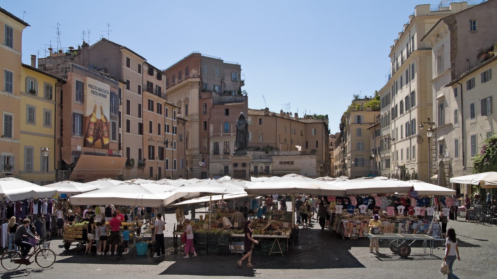 Fruit and vegetable stalls at the Campo de' Fiori morning market, a top spot for where to eat in Rome