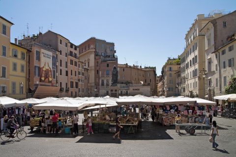 Fruit and vegetable stalls at the Campo de' Fiori morning market, a top spot for where to eat in Rome
