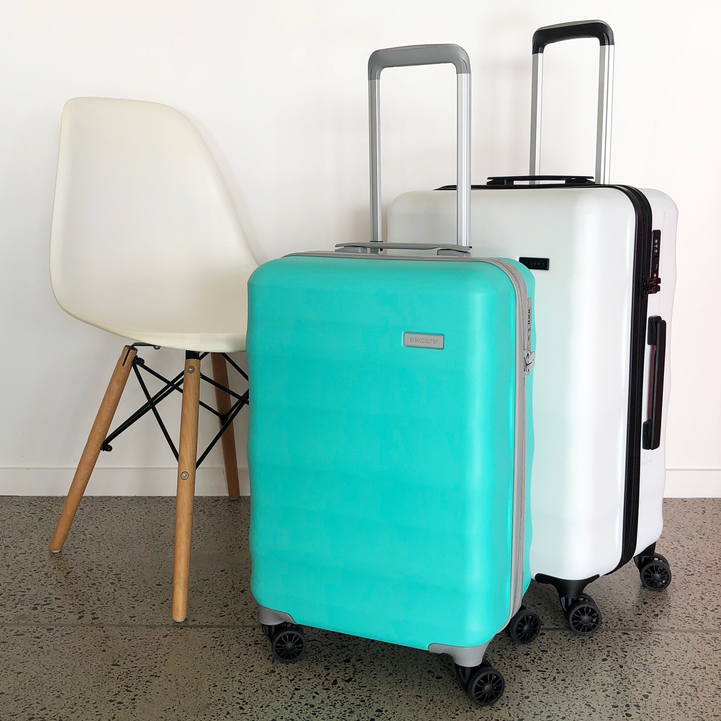 Two packed suitcases ready to go, illustrating a cruise packing list for a stateroom with limited space