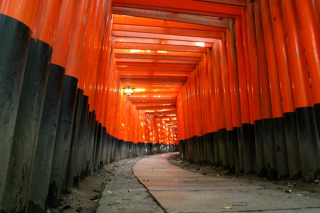 Vermilion torii gates at Fushimi Inari Shrine, a top attraction in Kyoto Japan