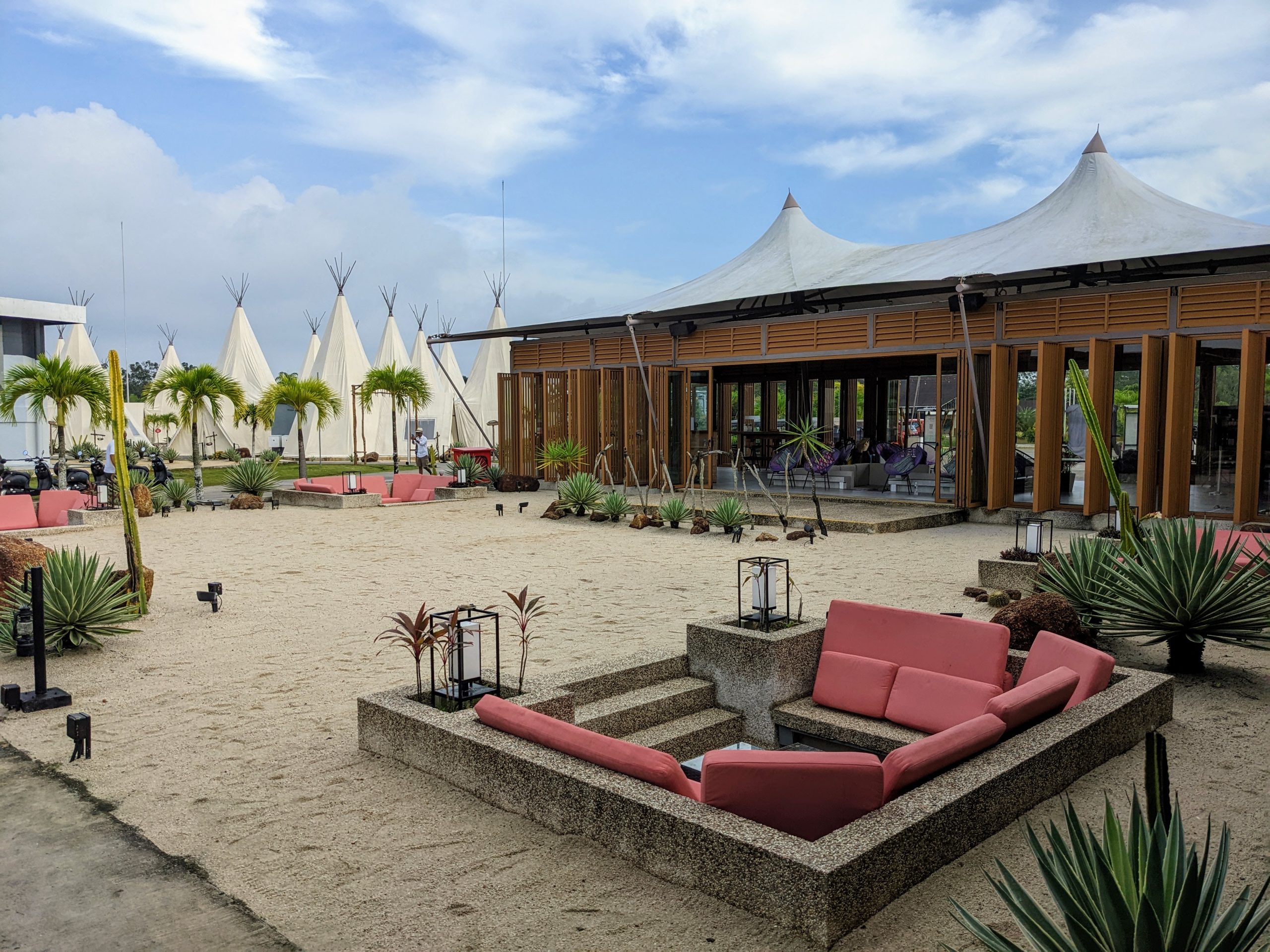 Luxury glamping resorts safari-style tents set among trees