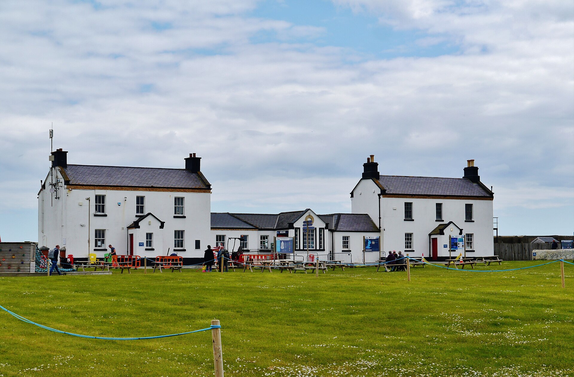 A whitewashed lighthouse keeper's cottage at Hook Head in County Wexford, Ireland