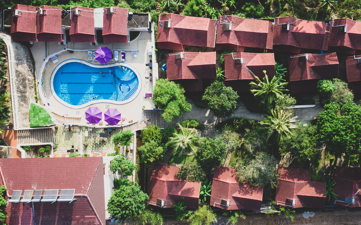 Poolside lounge area at a hotel offering day passes for a local staycation