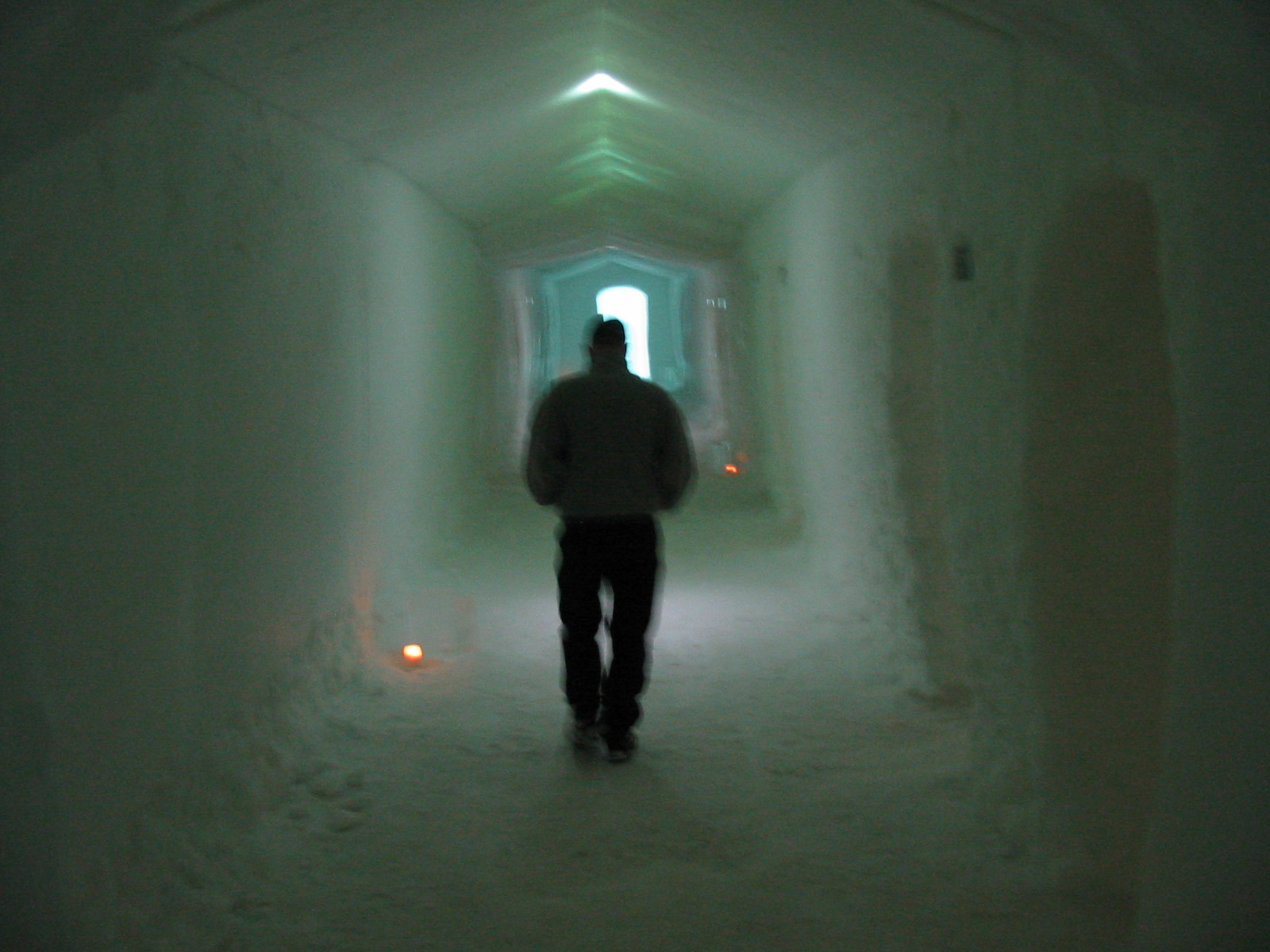 Glowing ice bar carved from river ice, part of the ice hotels in Scandinavia experience