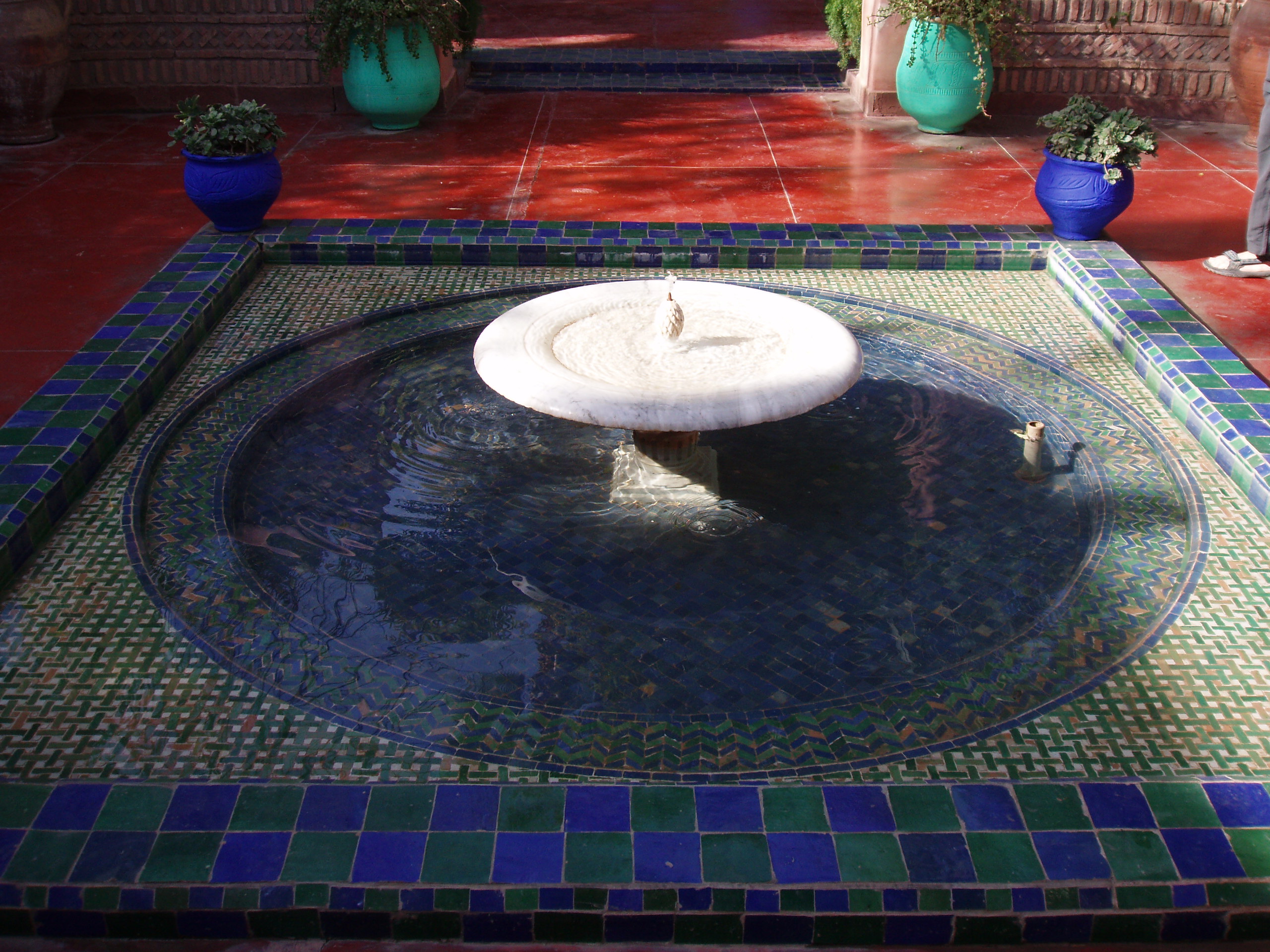 Cobalt-blue villa and cacti in Majorelle Garden, a quiet stop for Marrakech travel guide readers