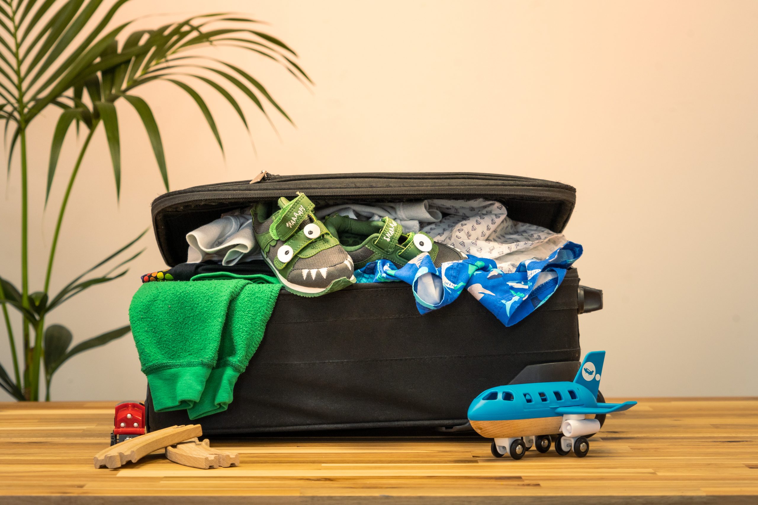 An overpacked suitcase, a common business travel packing list mistake