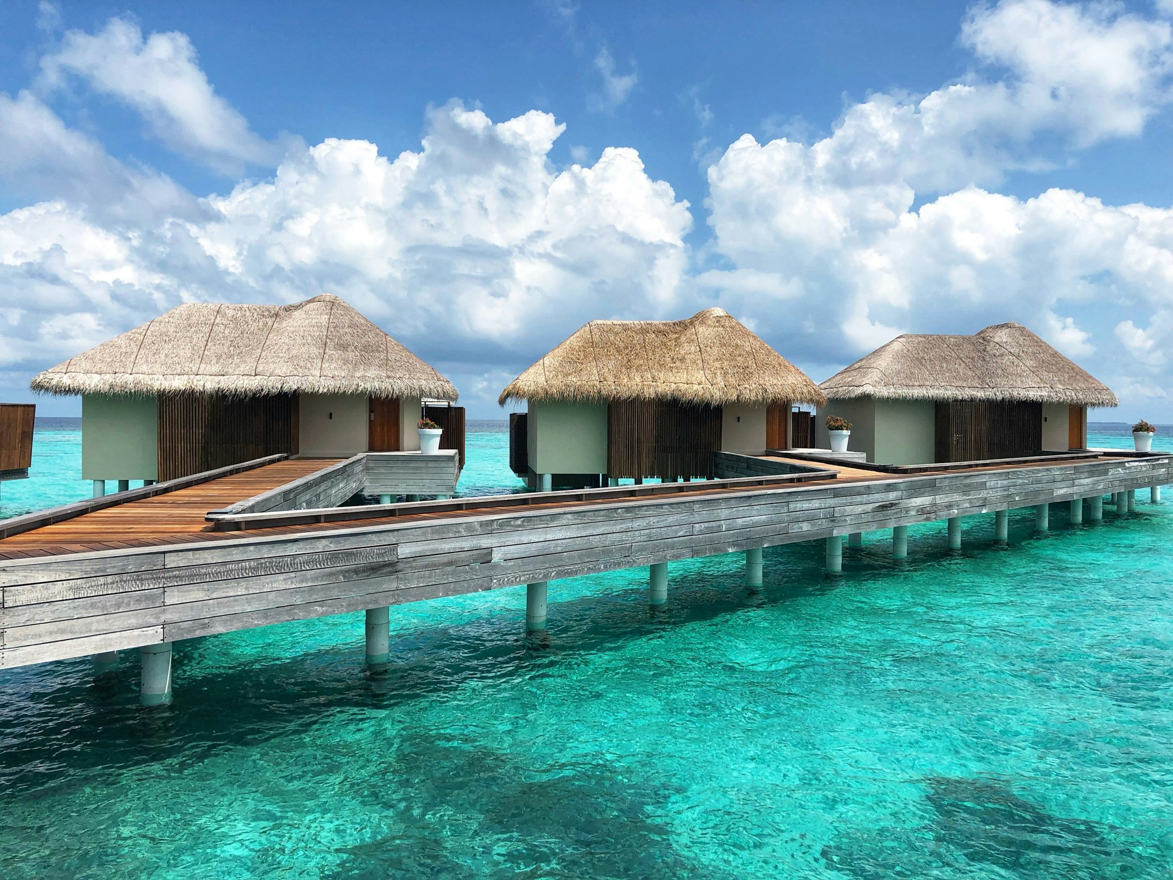 Overwater bungalow resort villa on stilts in the Maldives