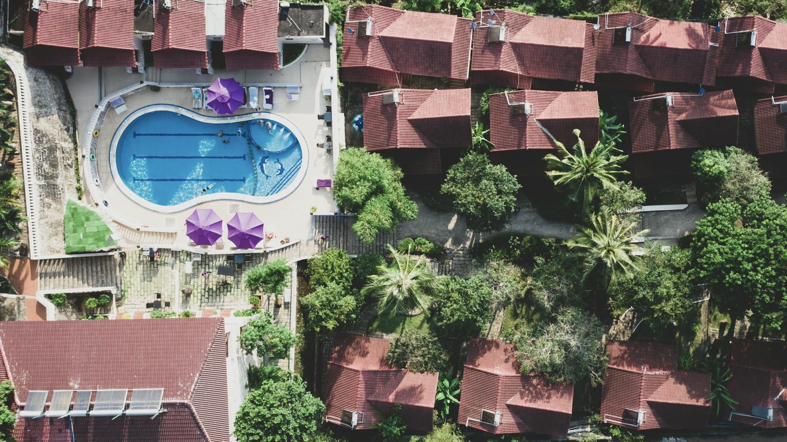 Calm hotel pool with no crowds, representing a quietcation wellness retreat