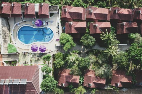 Calm hotel pool with no crowds, representing a quietcation wellness retreat