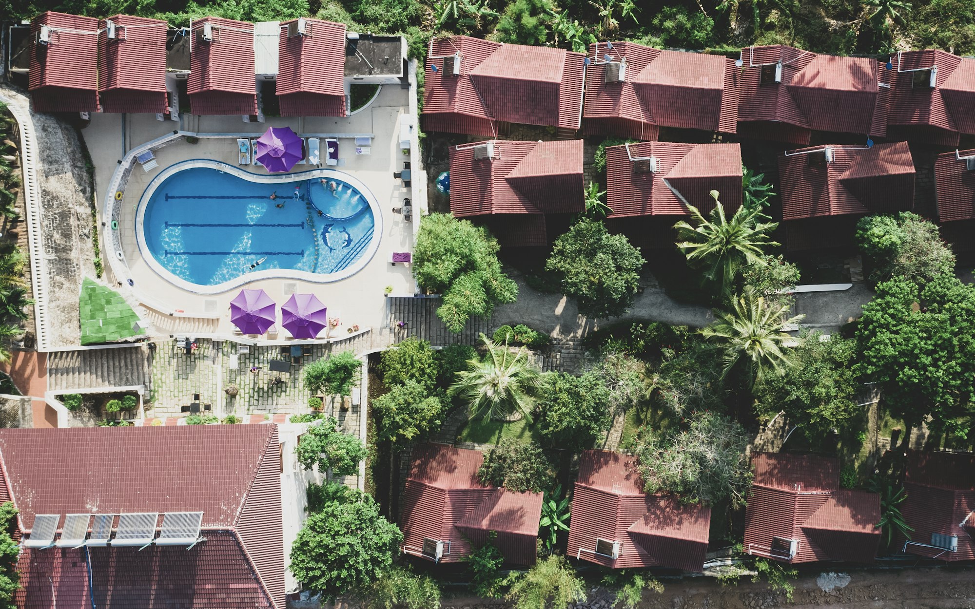 Calm hotel pool with no crowds, representing a quietcation wellness retreat