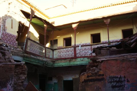 Traditional riad courtyard in Marrakech with an interior garden and tiled floor