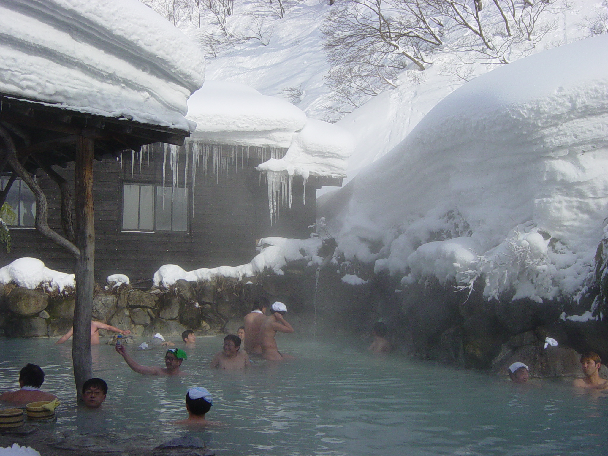 Traditional rotenburo open-air hot spring bath at Tsurunoyu onsen in Japan