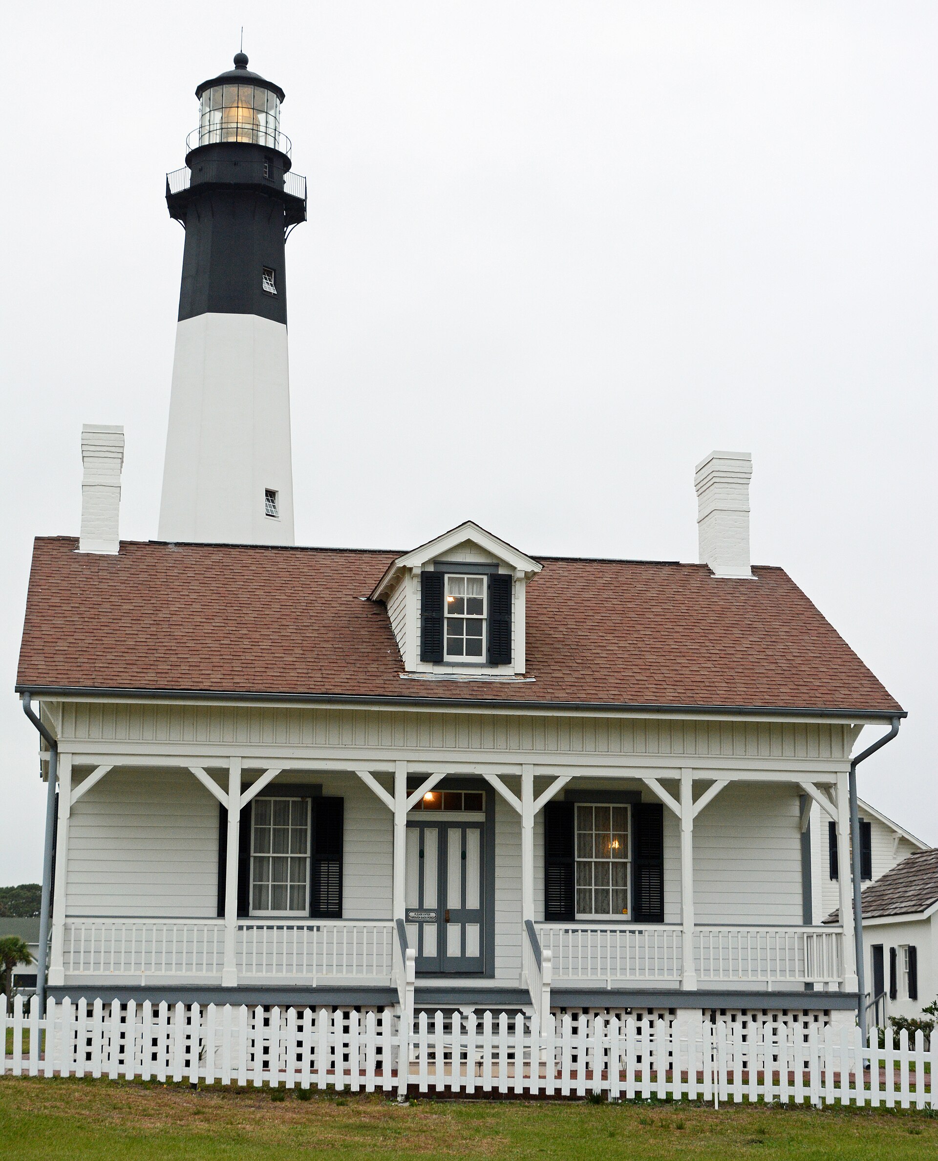 A restored lighthouse keeper's house now used for overnight lighthouse hotel stays